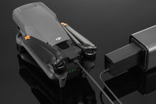 गैलरी व्यूवर में इमेज लोड करें, DJI Mavic 3 Drone Is Connected To A Black DJI 65W Portable Charger With A USB-C Cable