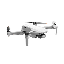 ಗ್ಯಾಲರಿ ವೀಕ್ಷಕಕ್ಕೆ ಚಿತ್ರವನ್ನು ಲೋಡ್ ಮಾಡಿ, Front-Right view of DJI Mini 4K drone with 4K