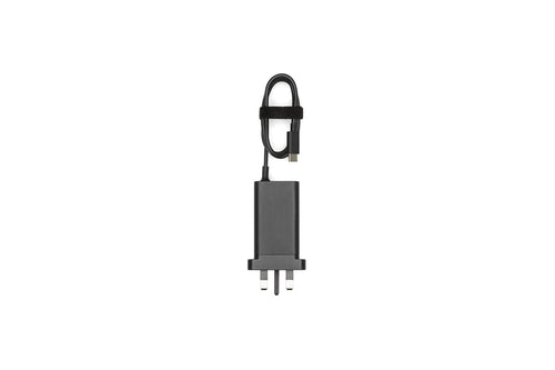 DJI 65W Portable Charger With A UK Plug And A Coiled USB-C Cable