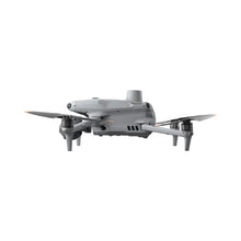 Load image into Gallery viewer, DJI Matrice 4T Drone Is Shown From A Low, Left-Facing Angle.The Drone&#39;s Four Propellers Are Visible, With Its Landing Gear Extended.
